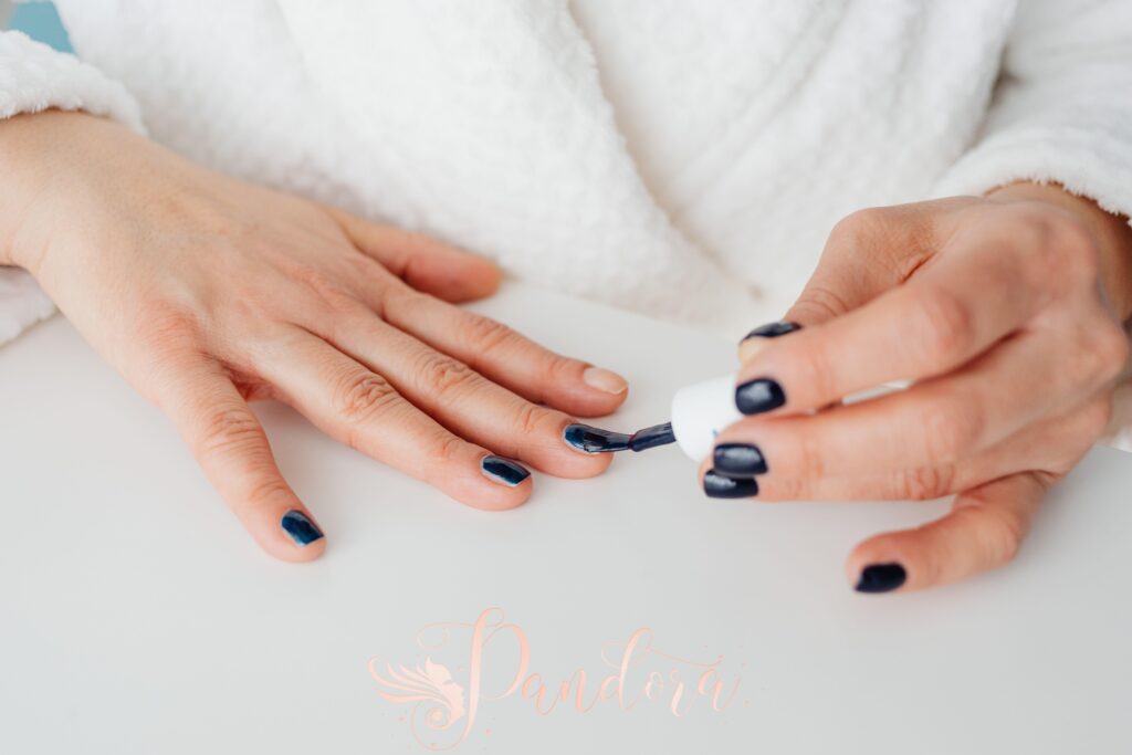 Professional dip powder nail application at Pandora Nail Spa in Lafayette