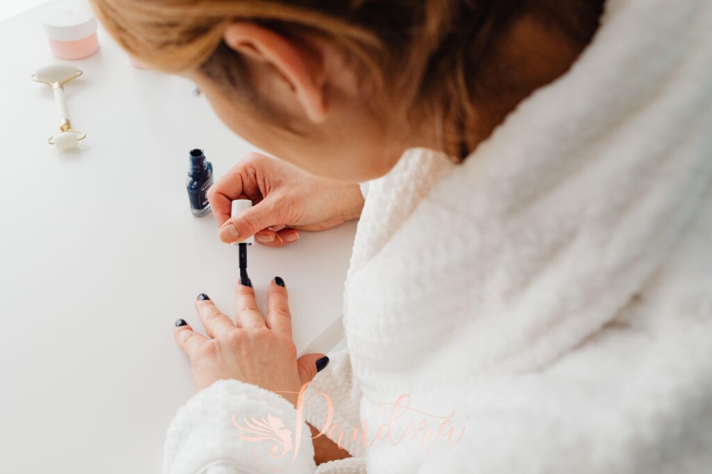 Nail strengthening treatment in progress at the salon