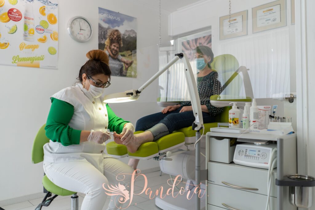 Client enjoying a soothing nail care spa pedicure in Lafayette salon