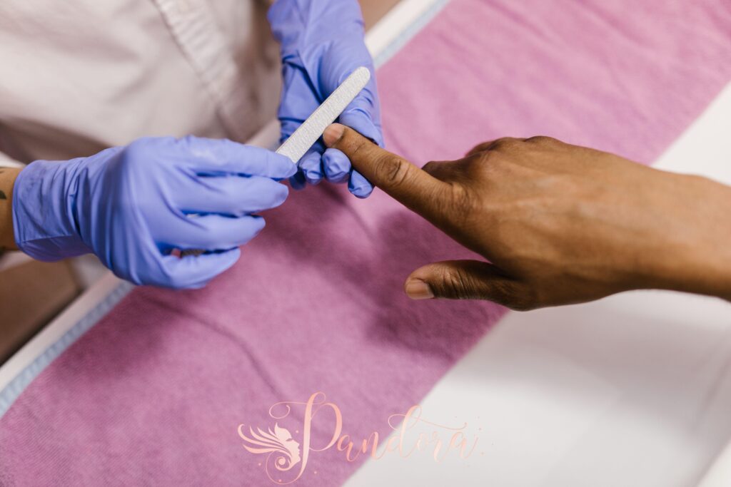 Professional pedicure nail shaping at Lafayette salon