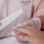 Close-up of a manicure procedure in a salon, showcasing detailed nail care techniques — Pandora Nail Spa, Lafayette, CA