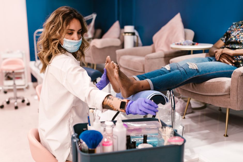 Professional pedicure with sanitized tools at a Lafayette nail salon