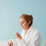 Sleep and brittle nails concept illustrated with a woman receiving nail care at Pandora Nail Spa in Lafayette, CA.
