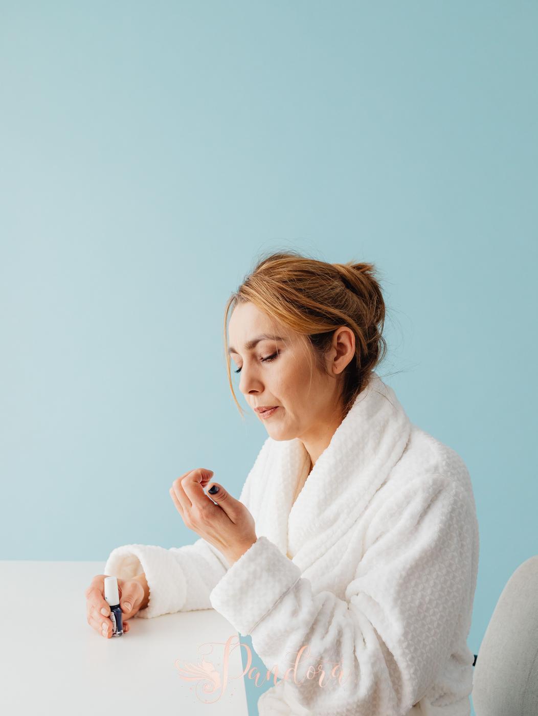 Sleep and brittle nails concept illustrated with a woman receiving nail care at Pandora Nail Spa in Lafayette, CA.