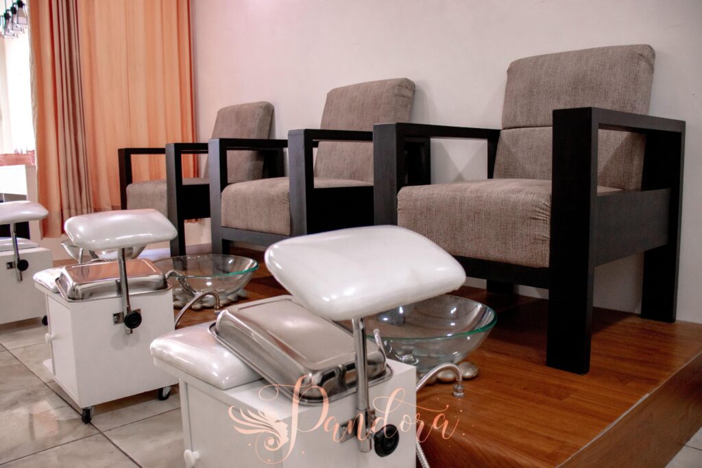 Cozy pedicure chairs and foot baths in a modern salon setting — Pandora Nail Spa, Lafayette, CA